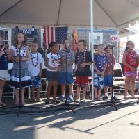 Island kids sang patriotic songs before awards were announced.