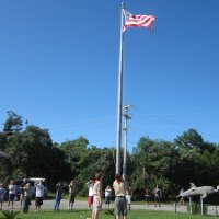 The local Boy Scouts raised the flag to start the day's festivities at 9am. 
