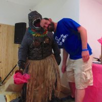 Girl-Zilla takes a bite out of her boyfriend's head after winning First Place in the Costume Contest.