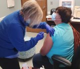 Hyde County Health director Luana Gibbs gets the COVID-19 vaccine.