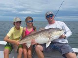 Nine year old Macy West (center) of Greenville, NC landed this monster drum yesterday on Sept. 2nd. She will get her citation for a catch and release of a 47