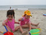 All babies deserve lifeguards! These two are enjoying the lifeguard beach c. 2007. 