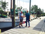 Buck Buchanan of Annapolis Maritime Museum and Tom Pahl of Ocracoke Alive shake on it.