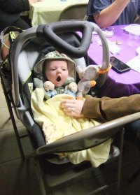 Little Isaac Vann was worn out by his first Mardi Gras.