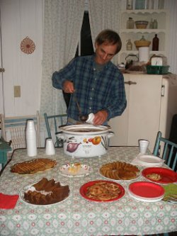 Gary Coye serves some OPS Wassail at the 2008 party.