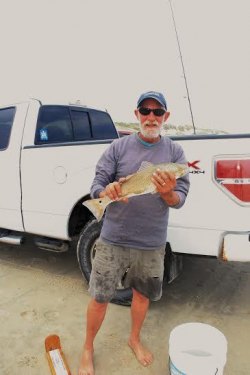 Bob Toth with a red drum