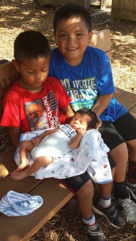 Imanol and Uriel with baby Gael