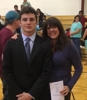 Posing at Senior Night with his lovely mother, Daniela.