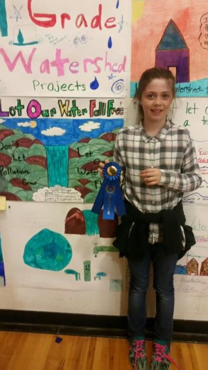 Congrats to Maren her 1st place poster! It says "Let Our Water Fall Free: Don't Let Pollution Grow, Let Our Water Flow!"