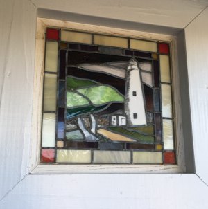 10.	This piece of stained glass was commissioned for the home.