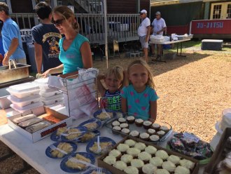Charlie and Daisy O'Neal worked the bake sale at fundraiser.
