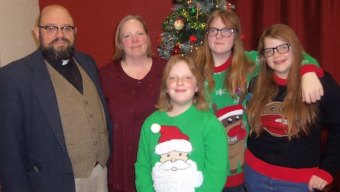 Pastor Richard Bryant and family show off their Christmas spirit! 
