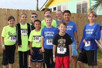 Some members of the Ocracoke School Running Club: Emilia, Elsie, Christian, Ronald, Jackson (front), Jayden (back), Dylan, Dirk, Edwin, and Julian 