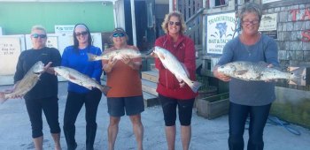 Reel Women from Ocean City, MD with their puppy drum catch-Donna Gutridge, Anita Chandler, Kelsey Cycyk, Meg Lesocky, and Wendy King.
