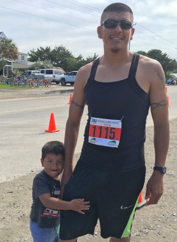 Chito Guerrero, winner of the 5K and the Half Marathon, poses with his youngest son, Gael. Both of Chito’s other sons also participated in the race.