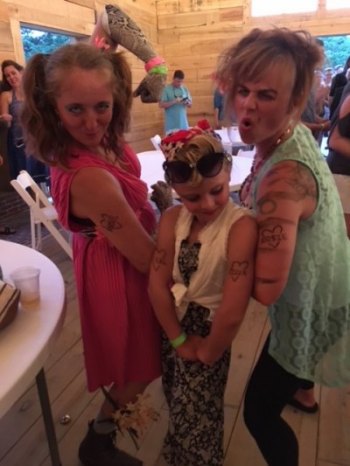 Rosie the Riveter, flanked by her Feral Godmother and Tiger Mom from the 2018 event