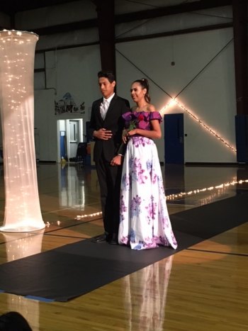 Senior Iris Trejo was escorted -- by choice -- by her brother, Christian. 