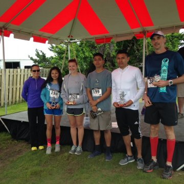 5K Winner's Circle: Angela, Karen, Jordan, Kevin, Gustavo, and Herb