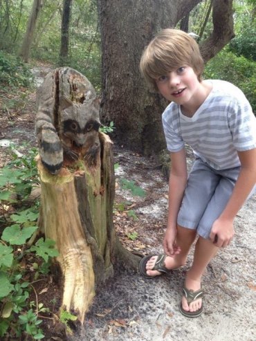 Ben with the raccoon carving at Springers Point.