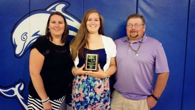 Mackenzie O'Neal poses with her parents, Serina and Carl. She and her brother, Chandler, both received all A's and B's this school year.