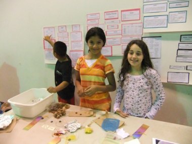 Vanessa Lora and Mila Ortiz pose with their projects.