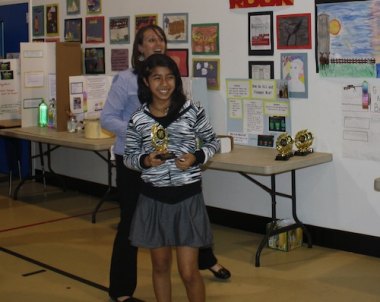 5th grader Ingrid Contreras accepts her award.