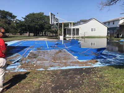 The outside basketball court was damaged, too.