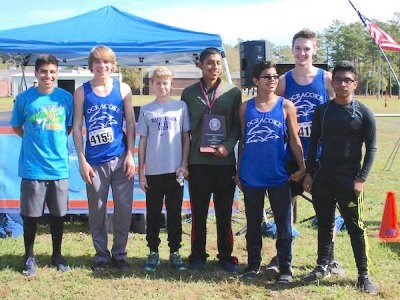 1st Runner-Up Ocracoke Dolphins with their plaque: Jordi Perez, Kyle Tillett, Colby Austin, Kevin Perez, Darvin Contreras, Evin Caswell, and Jeyson Resenediz. 