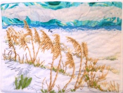 This quilted and embroidered piece by Satartia Collins (fabric artist and nurse at Ocracoke Health Center) took the top bid of the night at $250!