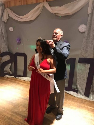 Principal Walt Padgett crowns senior Bricia Rivera as the 2017 Prom Queen