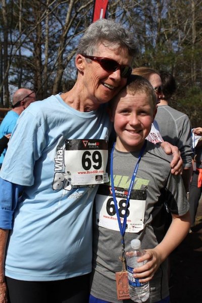 Running runs in the family! Dylan poses with his granny Jen. His parents both ran the race, too!