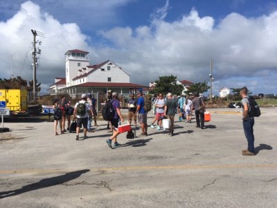 150 disaster relief volunteers walked on/off the Cedar Island ferry on Saturday to help out on Ocracoke. They were organized by One Harbor Church in Morehead City. 