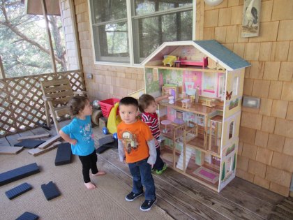 Yeah, they're cool with their big dollhouse: Cora, Kyler, and Sam.