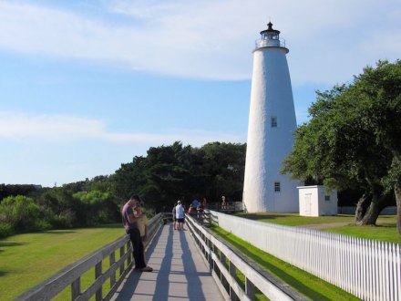 The author and his sister look for Pokémon at Ocracoke's iconic landmark. The lighthouse is a gym for Pokémon training.