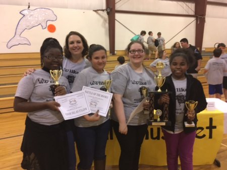 Tyriana Howard, Connie Gibbs, Elena Contreras, Samantha Cahoon, and Heavenly Daniels pose with their trophies.