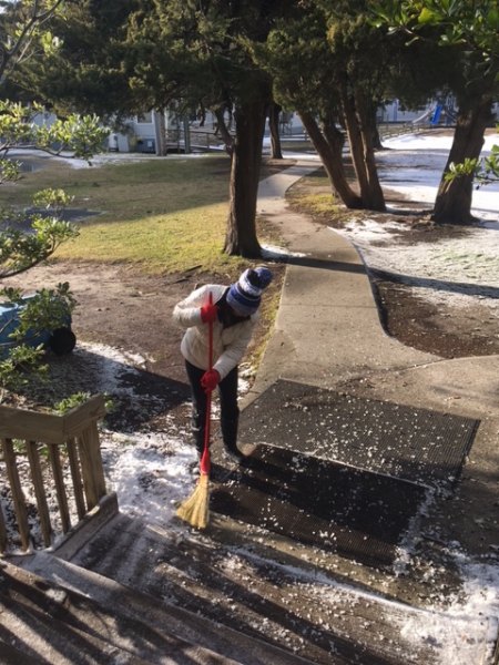 Ocracoke School principal Leslie Cole was sweeping snow (who owns a snow shovel on Ocracoke?) and salting the steps at the library on Thursday afternoon. This is one of her many duties as principal -- she didn't get a snow day!