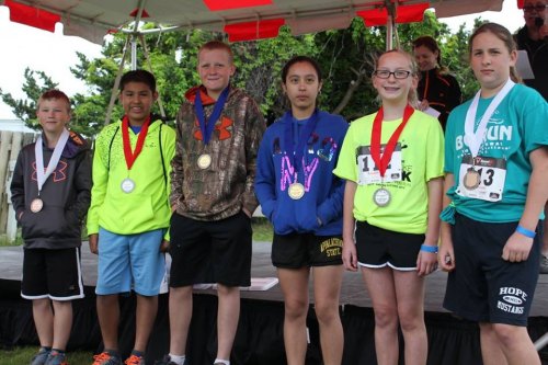 Age 11-13 5K winners: Jackson, Edwin, Dylan, Odalys (all from Ocracoke), and Anna and Madeleine O'Beirne from Greenville.