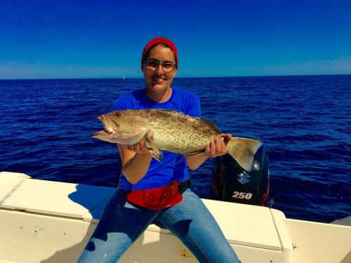 Maria with a 30-inch grouper