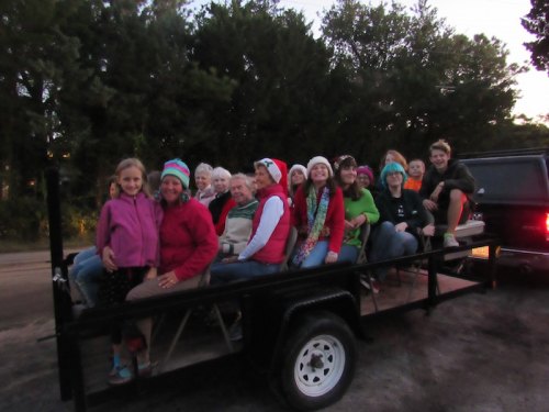 The photographer forgot to get a photo of the chorale wagon this year, but many of the faces are the same as in this shot from 2015!