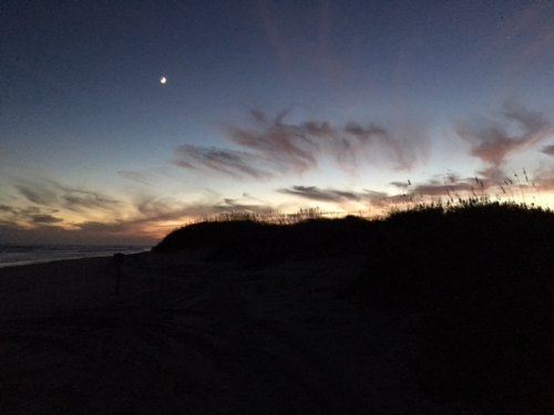 Crescent moon over the dunes