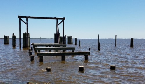 NC's first state-run ferry route was between this landing in Manns Harbor, and Roanoke Island, and was replaced by the William B. Umstead Bridge in 1957.