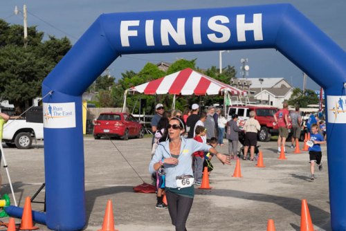 Sarah place first in her age group (40-49) and 24th overall in the 5K.