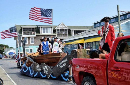 All are welcome to join the Ocracoke 4th of July Parade and compete for cash prizes! Ride the Wind took won Best in Show for their Join the Wave – or Die! float.