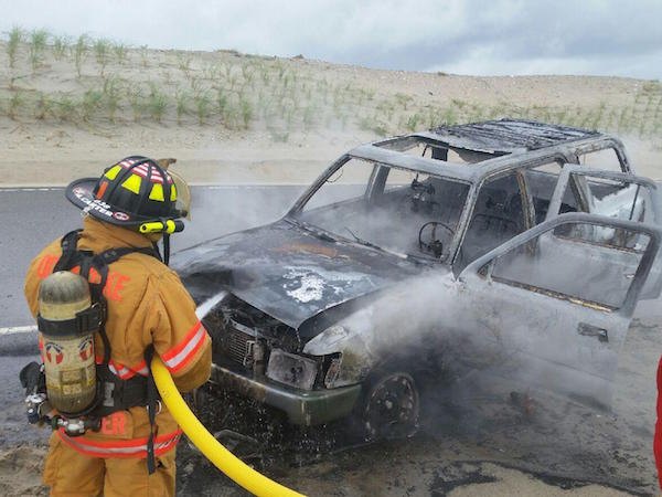 Adam Carter, pictured here, is one of the youngest OVFD members. This was his second car fire. Thanks to Mark Justice for this great action shot!