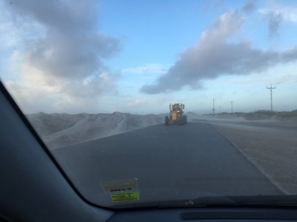 DOT already at work clearing off sand