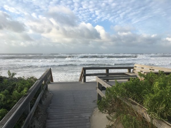 Tide was high at Pony Pen beach Tuesday morning